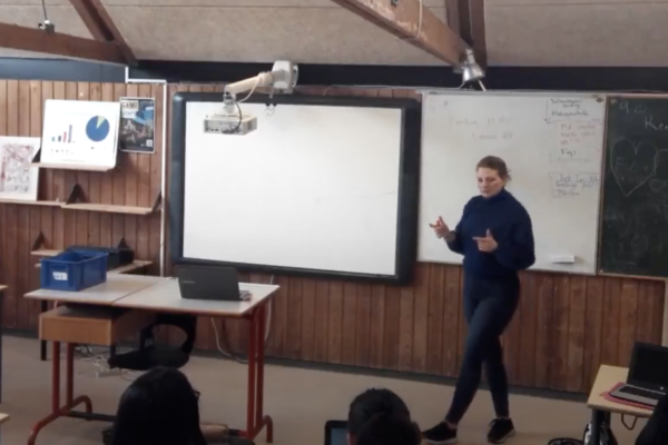 PHOTO - WOOF - External - Origin Story - Amalie teaching - 1